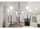 Modern chandelier illuminates the room and complements the contemporary design at 2925 Wigwam Pkwy # 923, Henderson, NV 89074