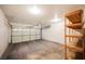 Spacious garage with door, storage shelves and concrete floor at 2925 Wigwam Pkwy # 923, Henderson, NV 89074