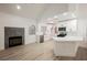 Modern kitchen with white cabinets, stainless appliances, quartz countertop island and vaulted ceilings at 2925 Wigwam Pkwy # 923, Henderson, NV 89074