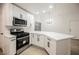 Beautiful kitchen featuring stainless appliances, quartz countertops and plenty of storage space at 2925 Wigwam Pkwy # 923, Henderson, NV 89074