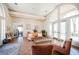 Inviting lobby area with comfortable seating, tile flooring, and abundant natural light from large windows at 2925 Wigwam Pkwy # 923, Henderson, NV 89074