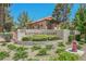 Community sign with landscaping and building address at 2925 Wigwam Pkwy # 923, Henderson, NV 89074