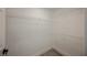 Walk-in closet with white wire shelving and neutral flooring at 2925 Wigwam Pkwy # 923, Henderson, NV 89074