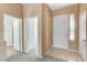 Entryway featuring tile flooring and neutral carpet, with access to bathroom at 3008 Hot Cider Ave, North Las Vegas, NV 89031