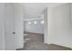 Bright hallway featuring neutral paint, plush carpet, and easy access to other rooms at 3008 Hot Cider Ave, North Las Vegas, NV 89031