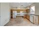 Spacious kitchen featuring a center island, wood cabinets, and modern appliances at 3008 Hot Cider Ave, North Las Vegas, NV 89031