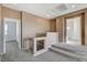 Open loft area with neutral carpeting and multiple entryways at 3008 Hot Cider Ave, North Las Vegas, NV 89031