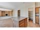 A kitchen with a center island, granite countertops, and a walk-in pantry at 3008 Hot Cider Ave, North Las Vegas, NV 89031
