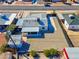 Aerial view of the property highlighting its gravel yard and covered patio at 457 Federal St, Henderson, NV 89015