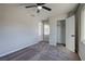 Bedroom features a ceiling fan, closet and new carpet at 457 Federal St, Henderson, NV 89015