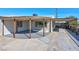 Inviting covered front porch with cozy seating area perfect for enjoying the outdoors at 457 Federal St, Henderson, NV 89015