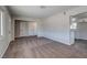 Inviting living room with fresh carpet, and an open flow to the adjacent kitchen at 457 Federal St, Henderson, NV 89015
