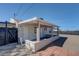 The rear view includes a view of the backyard, the patio, and a storage shed at 457 Federal St, Henderson, NV 89015