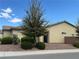 Inviting single-story home featuring well-maintained desert landscaping and a drought-tolerant yard at 4695 E Lucera Ct, Pahrump, NV 89061
