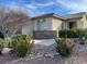Charming single-story home with desert landscaping, rock accents, and a stone veneer facade at 4695 E Lucera Ct, Pahrump, NV 89061