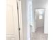 Hallway showing multiple doors and tile floor at 4695 E Lucera Ct, Pahrump, NV 89061