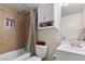Updated bathroom features tiled shower, vanity, and new fixtures at 4708 Thunderbolt Ave, Las Vegas, NV 89115