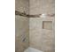 Bathroom shower with decorative tile and built-in niche at 4708 Thunderbolt Ave, Las Vegas, NV 89115