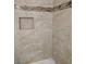 Bathroom shower with decorative tile and built-in niche at 4708 Thunderbolt Ave, Las Vegas, NV 89115