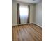 Bedroom featuring modern flooring, neutral paint, and window at 4708 Thunderbolt Ave, Las Vegas, NV 89115