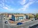 Two-story apartment building with a yard surrounded by chain link fence at 4708 Thunderbolt Ave, Las Vegas, NV 89115