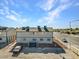 Two-story apartment building with a row of air conditioning units on the roof at 4708 Thunderbolt Ave, Las Vegas, NV 89115