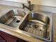 Stainless steel double basin sink featuring gooseneck faucet at 4708 Thunderbolt Ave, Las Vegas, NV 89115