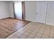 Inviting living room featuring wood floors, a bright window, and a classic white front door at 4708 Thunderbolt Ave, Las Vegas, NV 89115