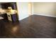 The kitchen is open to the living room with wood floors at 4708 Thunderbolt Ave, Las Vegas, NV 89115