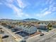 Neighborhood featuring rows of two-story apartment buildings and mountain views at 4708 Thunderbolt Ave, Las Vegas, NV 89115