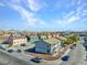 View of a neighborhood with rows of two-story apartment buildings on a sunny day at 4708 Thunderbolt Ave, Las Vegas, NV 89115