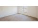 Cozy bedroom featuring neutral carpet and a sunlit window at 4847 Double Down Dr # 101, Las Vegas, NV 89122
