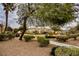 Community park with walking path, desert landscaping, and shaded gazebos at 4847 Double Down Dr # 101, Las Vegas, NV 89122