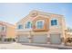 Charming townhome featuring a private balcony and attached two-car garage at 4847 Double Down Dr # 101, Las Vegas, NV 89122