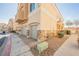 Townhome with a view of its attached garage and nicely landscaped yard at 4847 Double Down Dr # 101, Las Vegas, NV 89122