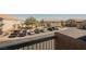 A view of the neighborhood and parking lot from a home's upper balcony at 4847 Double Down Dr # 101, Las Vegas, NV 89122