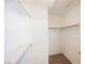 Walk-in closet has shelving and racks for storing clothing and accessories at 4847 Double Down Dr # 101, Las Vegas, NV 89122
