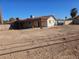 Backyard area featuring a covered patio and ample space for outdoor enjoyment at 4905 Danbrook Ct, Las Vegas, NV 89110