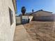 Backyard with space for landscaping, providing a blank canvas for personalization at 4905 Danbrook Ct, Las Vegas, NV 89110