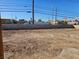 Backyard with a secure block wall, providing privacy and space for landscaping at 4905 Danbrook Ct, Las Vegas, NV 89110