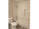 Modern bathroom features tile surround, in-shower shelves, with a shower and bathtub at 4905 Danbrook Ct, Las Vegas, NV 89110