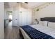 Charming bedroom with a ceiling fan, closet, and an attractive color palette at 4923 Strauss Dr, Las Vegas, NV 89146