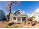 Community clubhouse boasts charming exterior, surrounded by unique landscaping features at 4923 Strauss Dr, Las Vegas, NV 89146