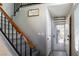 Inviting entryway featuring a staircase and a security screen door with natural light at 4923 Strauss Dr, Las Vegas, NV 89146
