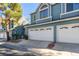 Charming townhouse featuring a two-car garage and a well-maintained yard at 4923 Strauss Dr, Las Vegas, NV 89146