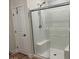 Modern shower with glass enclosure, seating, and chrome fixtures at 5230 Lissome Lily Ct, Las Vegas, NV 89139