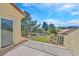 Enjoy beautiful views from this outdoor balcony overlooking lush landscaping and greenery at 5421 Painted Mirage Rd, Las Vegas, NV 89149
