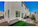 View of the home's backyard featuring an outdoor patio and fenced yard space at 5861 Secret Island Dr, Las Vegas, NV 89139