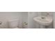 Half bathroom features white fixtures and a pedestal sink at 5861 Secret Island Dr, Las Vegas, NV 89139