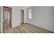 Bedroom with wood-style flooring, and closet space at 5861 Secret Island Dr, Las Vegas, NV 89139